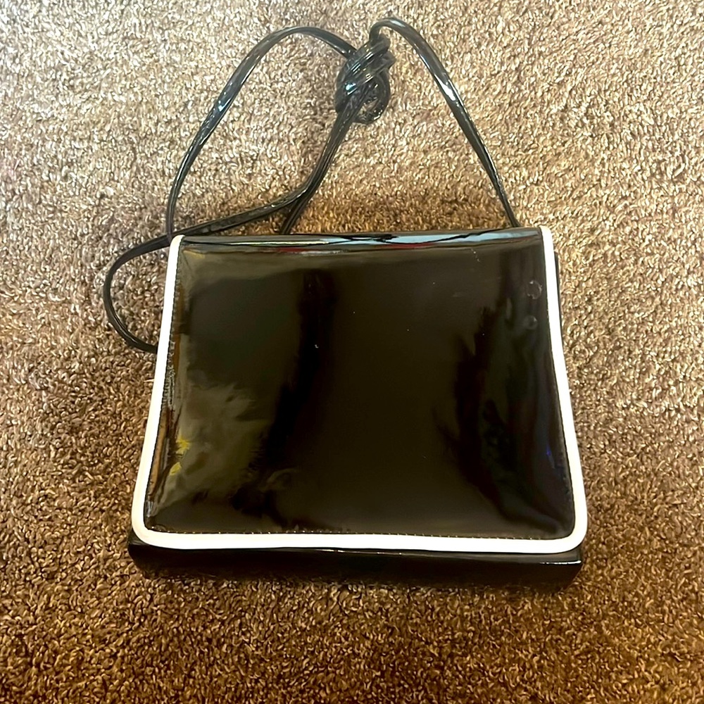 The Furst Collection patent leather‎ purse
